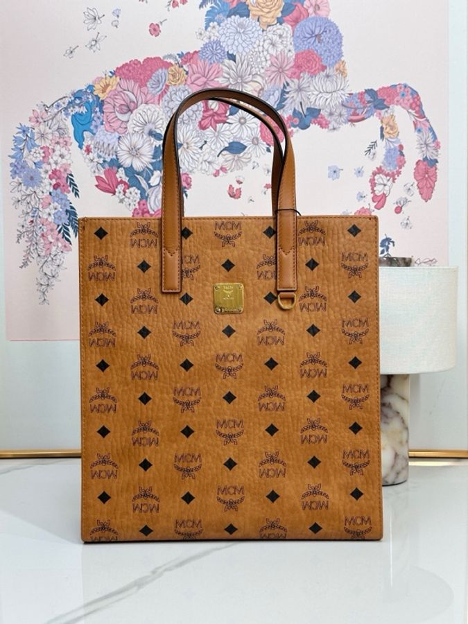 MCM 棕色滿印斜挎包 手提包 男女適用-1