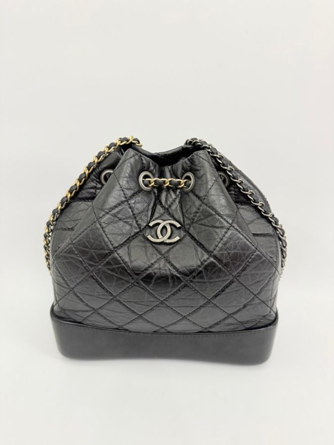 Chanel 黑復刻牛皮霧銀釦皮穿鍊流浪後背包-1