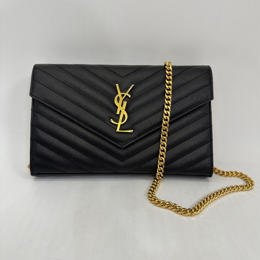 YSL  黑魚子醬牛皮金釦 WOC-0