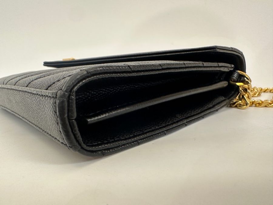 YSL  黑魚子醬牛皮金釦 WOC-2
