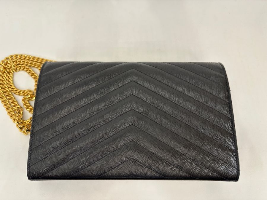 YSL  黑魚子醬牛皮金釦 WOC-4