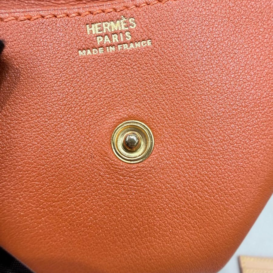 HERMES 橙色LE 24 金扣零錢包 框C I325-8