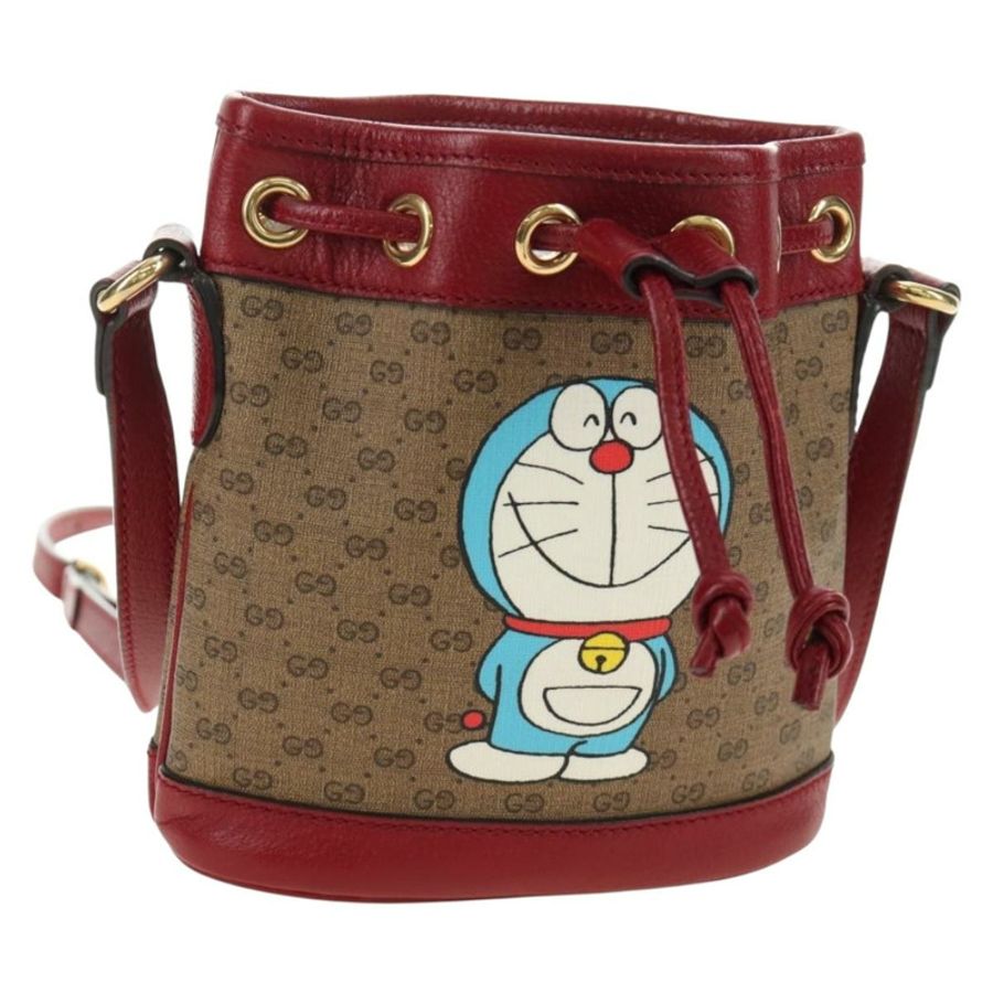 【日本直送】GUCCI GUCCI × Doraemon 聯名款 Micro GG Supreme 手提包 PVC 米色 金色 647801 正品 185900M-0