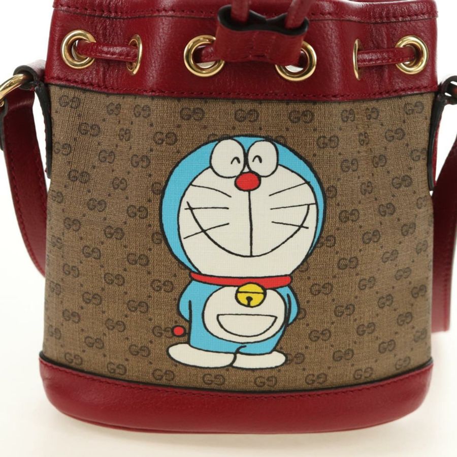 【日本直送】GUCCI GUCCI × Doraemon 聯名款 Micro GG Supreme 手提包 PVC 米色 金色 647801 正品 185900M-1