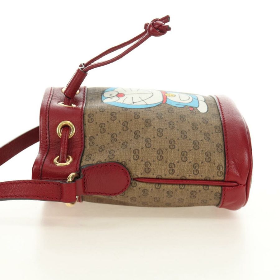 【日本直送】GUCCI GUCCI × Doraemon 聯名款 Micro GG Supreme 手提包 PVC 米色 金色 647801 正品 185900M-3