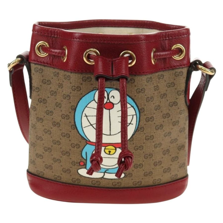 【日本直送】GUCCI GUCCI × Doraemon 聯名款 Micro GG Supreme 手提包 PVC 米色 金色 647801 正品 185900M-12