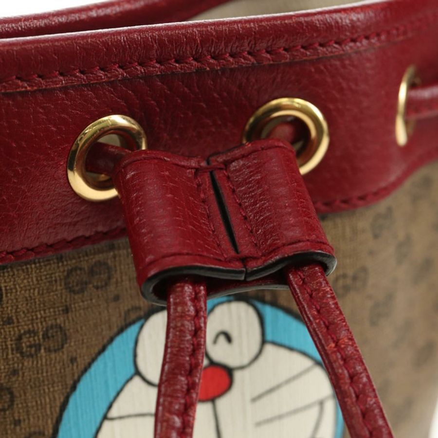 【日本直送】GUCCI GUCCI × Doraemon 聯名款 Micro GG Supreme 手提包 PVC 米色 金色 647801 正品 185900M-18