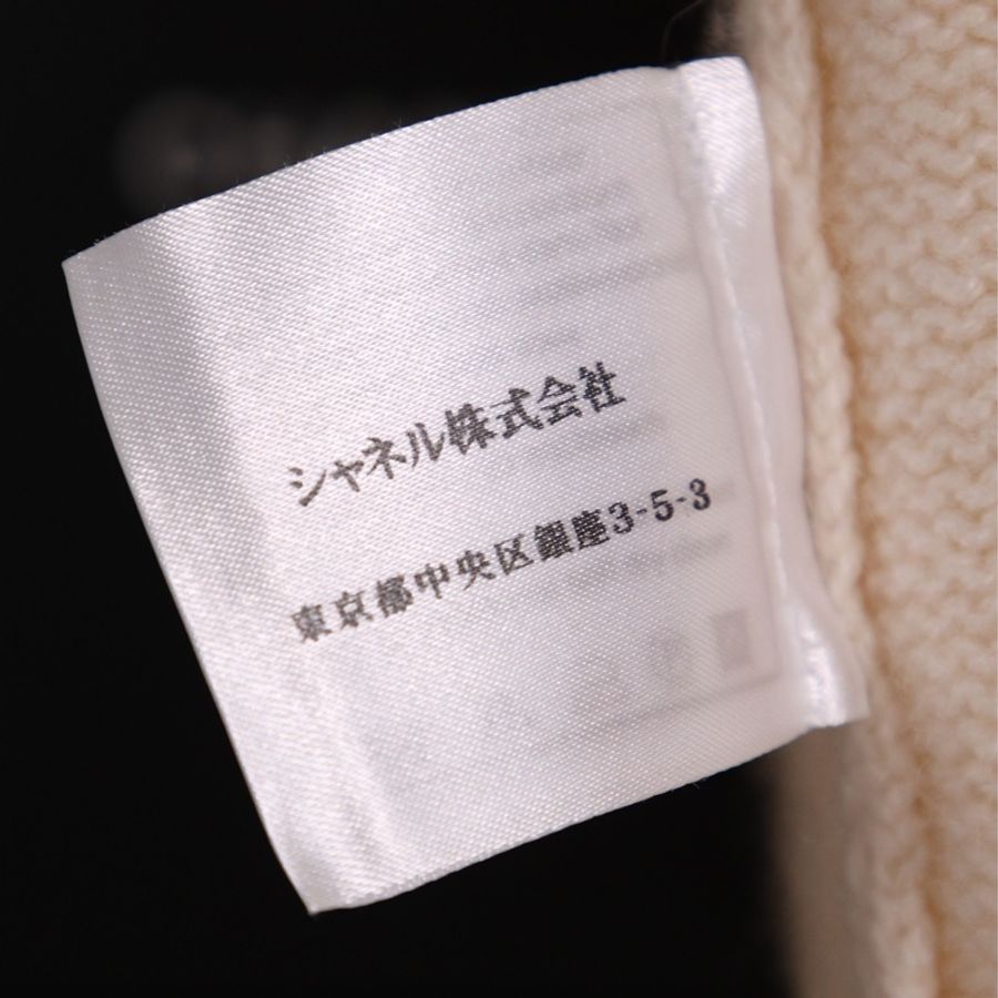 Chanel 06年奶白色山羊绒镂空花边袖口针织圆领短袖上衣外套半裙套装-29