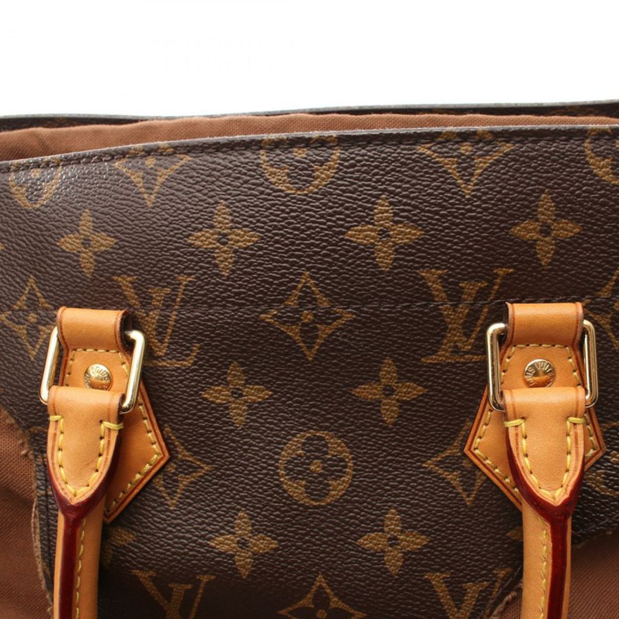 路易威登 (LOUIS VUITTON) 川久保玲 (Rei Kawakubo) 設計的鏤空 Monogram 手提包 M40279 LV-6