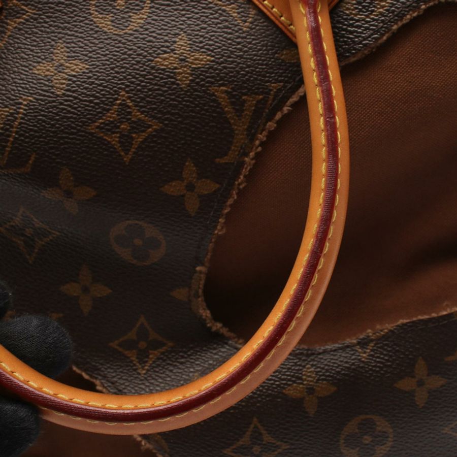 路易威登 (LOUIS VUITTON) 川久保玲 (Rei Kawakubo) 設計的鏤空 Monogram 手提包 M40279 LV-9