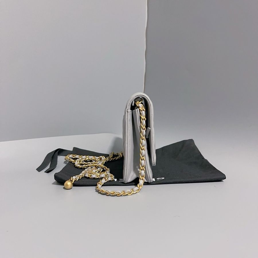CHANEL香奈兒 WOC 小金球鏈條包 單肩包斜挎包金扣 皮穿鏈 菱格 羊皮材質金色五金 女款 淡灰色-4