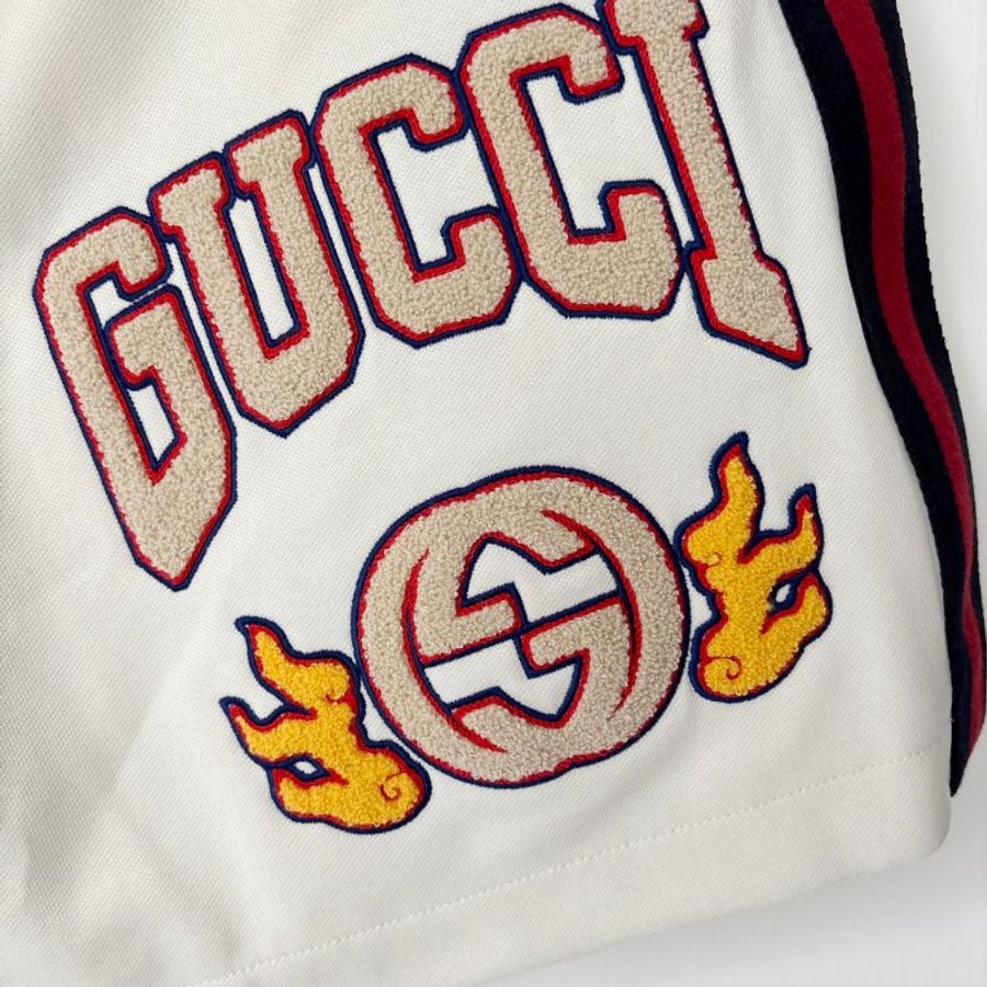 S號 ::GUCCI:: 雙G火焰圖騰刺繡 經典藍紅織帶運動短褲-1