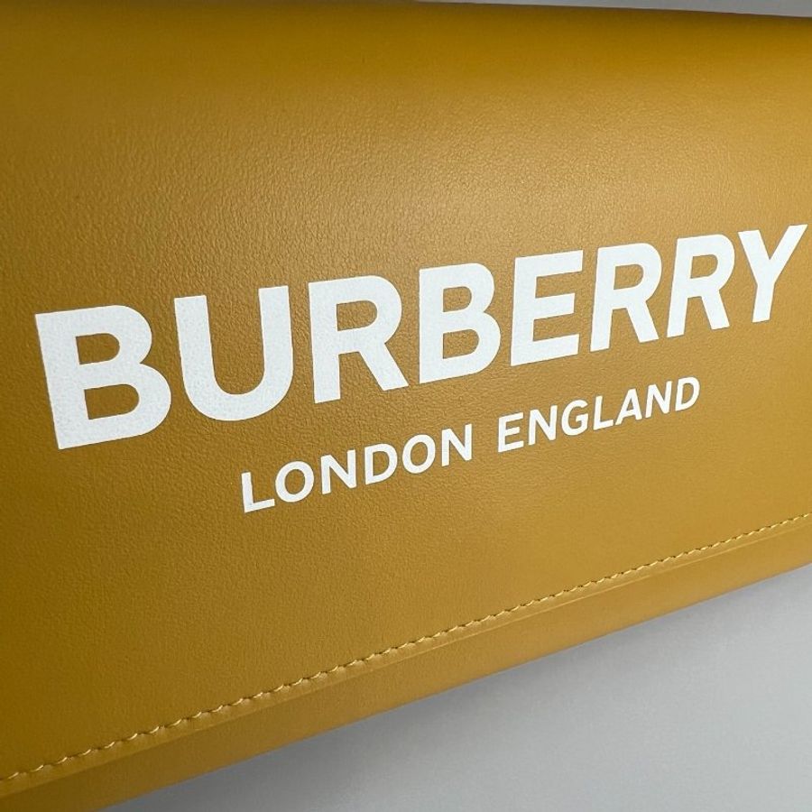 BURBERRY 黃皮革白字WOC包-13