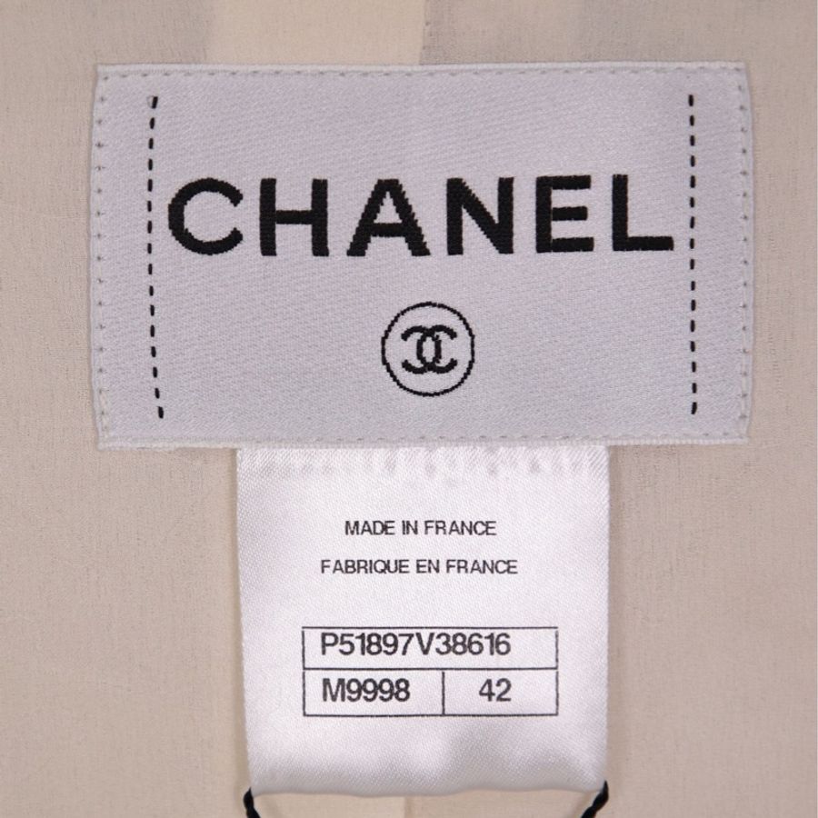 Chanel 15年萨尔茨堡系列秀款白色双排狮头扣四口袋外套FR42 25/11-15