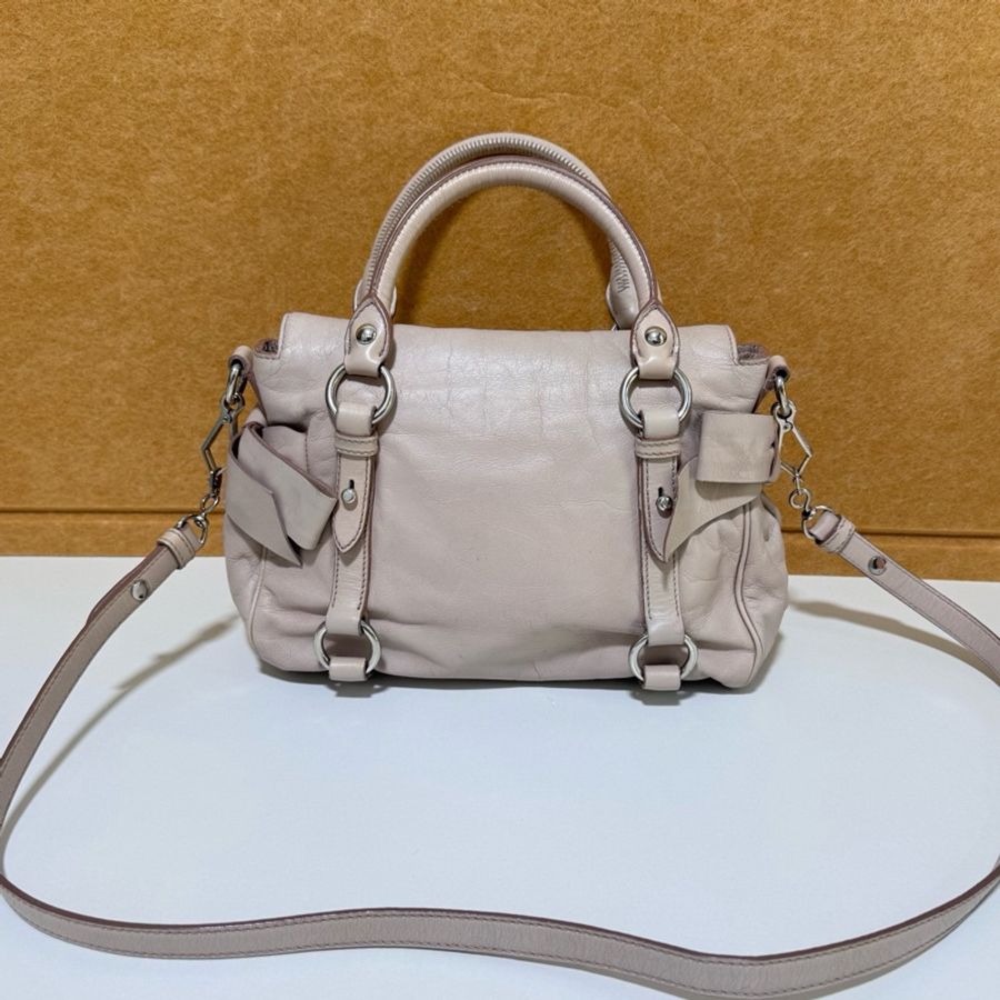Miu Miu • 經典裸粉色蝴蝶結油臘皮機車包 🈶原廠背帶-2