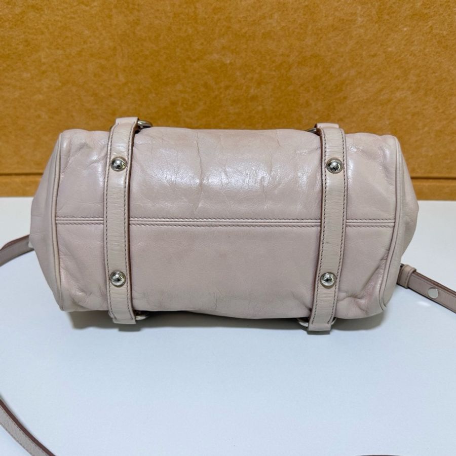 Miu Miu • 經典裸粉色蝴蝶結油臘皮機車包 🈶原廠背帶-5