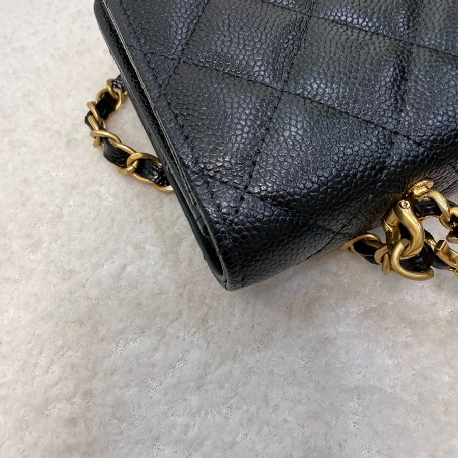 Chanel 黑金荔枝紋牛皮鏤空雙C 手柄woc-19