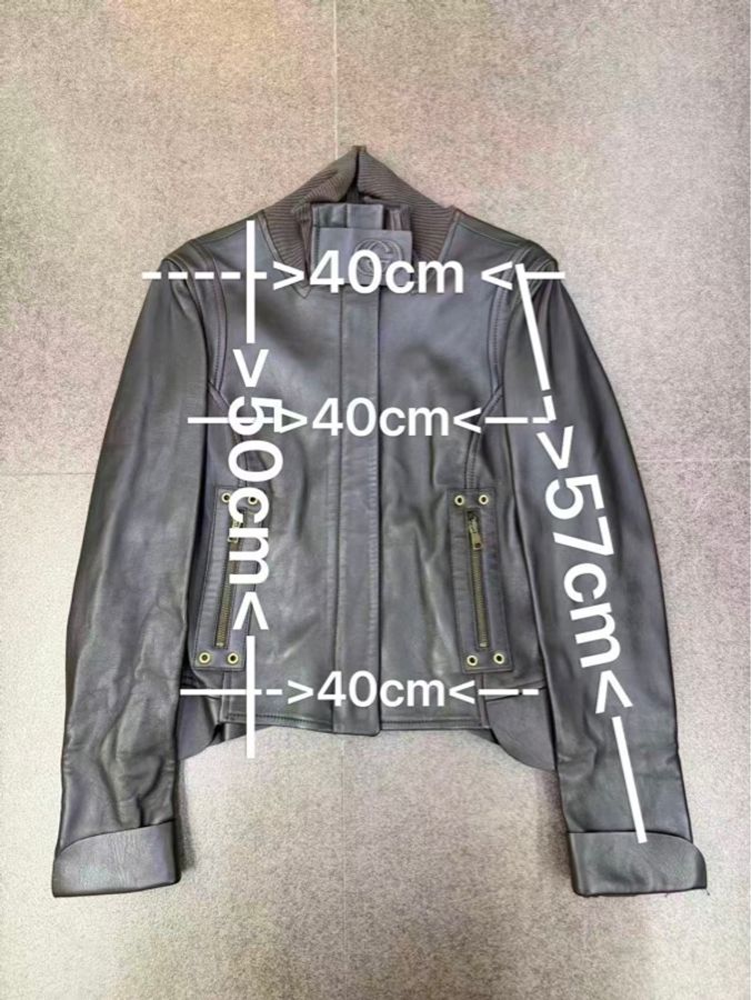 這是一件 Gucci 的黑色皮革夾克外套-2