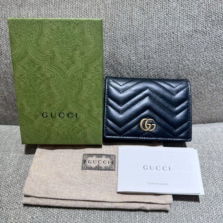 GUCCI 黑牛皮山型紋霧金釦-0
