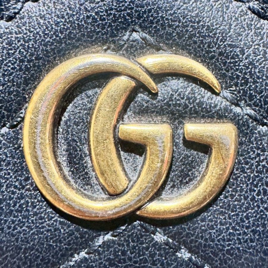 GUCCI 黑牛皮山型紋霧金釦-4