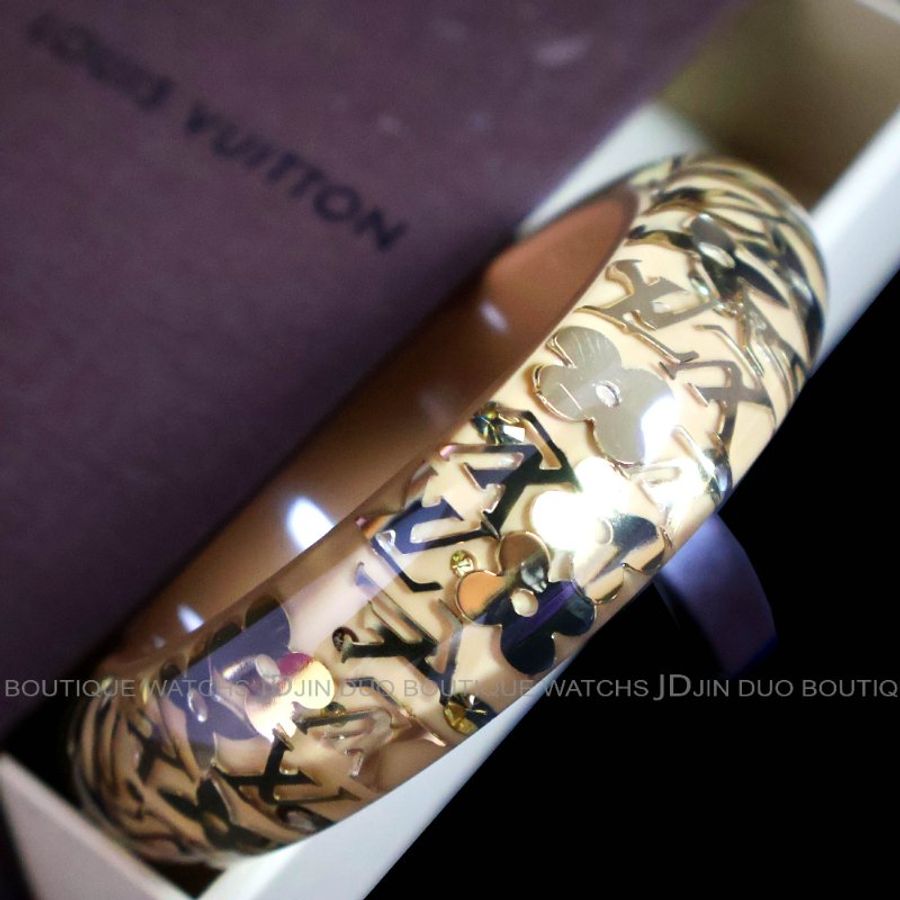 金鐸精品~2543 LOUIS VUITTON LV路易威登M65607金色字紋圓花透明與杏仁色壓克力寬版手環-1