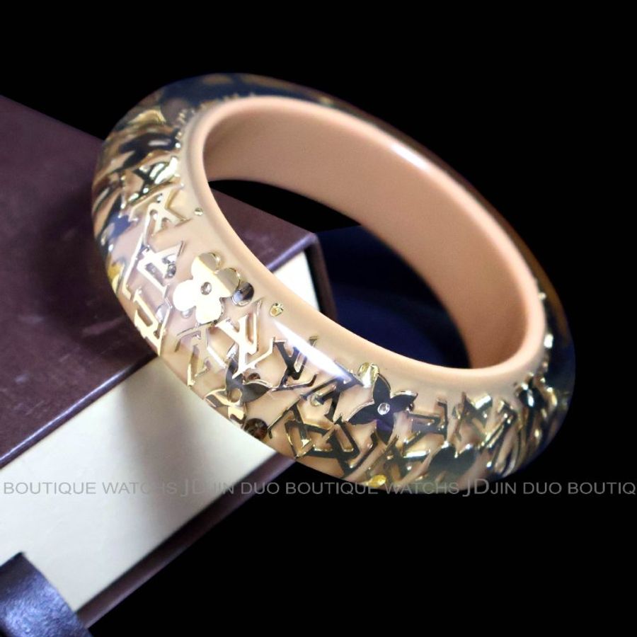 金鐸精品~2543 LOUIS VUITTON LV路易威登M65607金色字紋圓花透明與杏仁色壓克力寬版手環-2