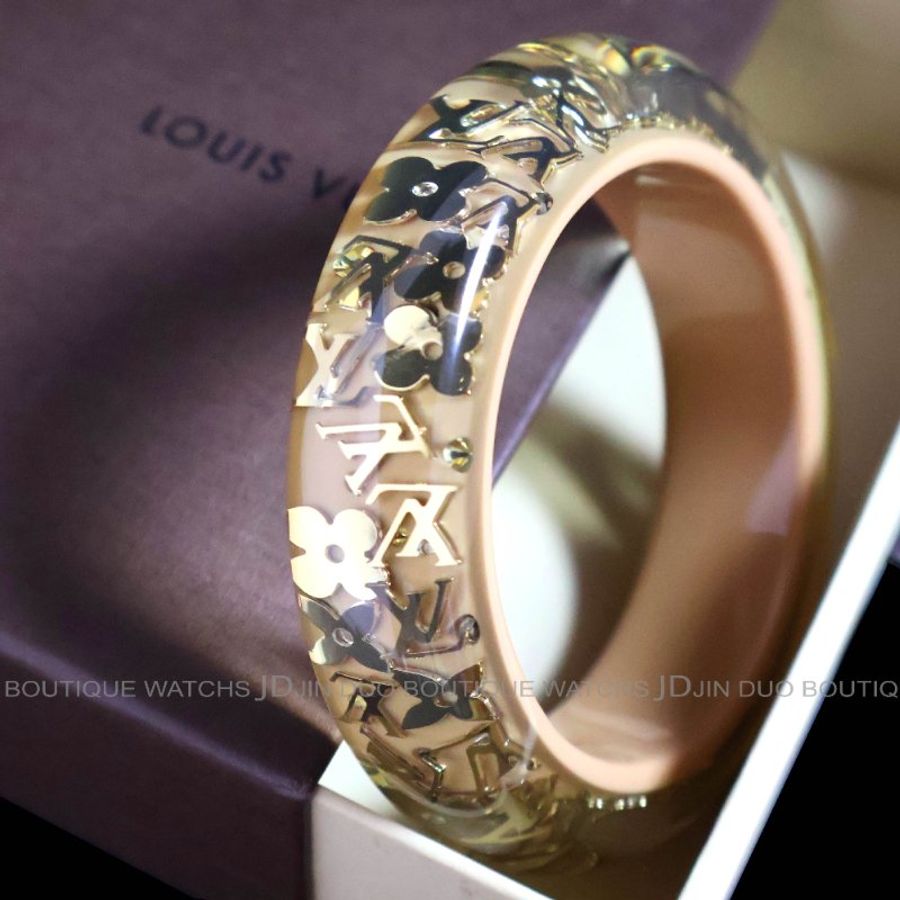 金鐸精品~2543 LOUIS VUITTON LV路易威登M65607金色字紋圓花透明與杏仁色壓克力寬版手環-3