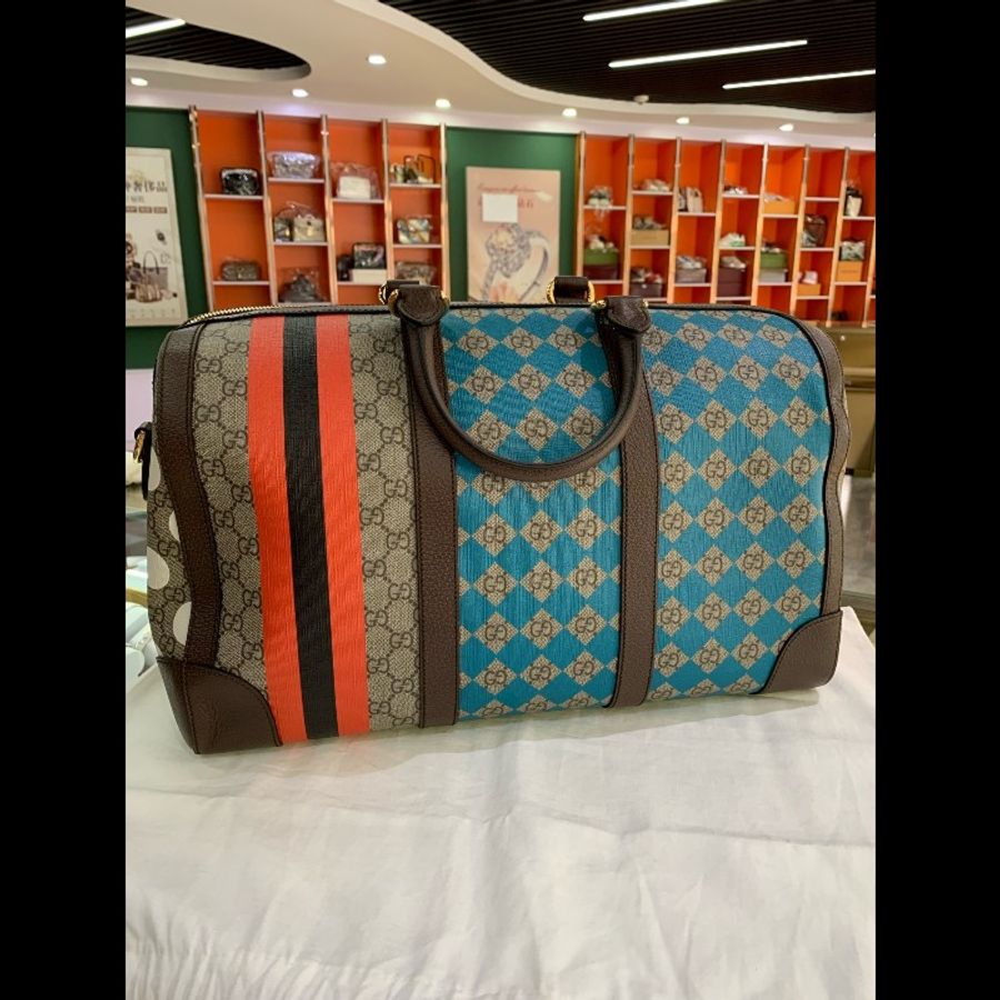 GUCCI老花Logo彩色幾何印花秀場限定旅行包-0