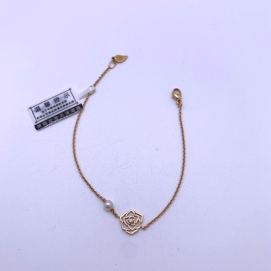 Piaget伯爵玫瑰金ROSE系列鏤空玫瑰花鑽石珍珠手鍊 材質:Au750-3