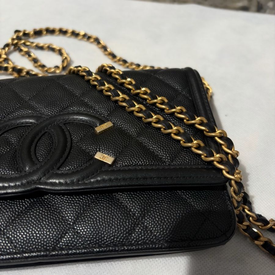 Chanel黑荔枝牛皮Woc-9