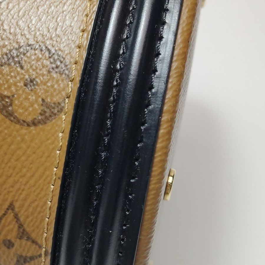 Louis Vuitton (LV) Cannes發財桶小號牛皮Reverse老花單肩包晶片款-19