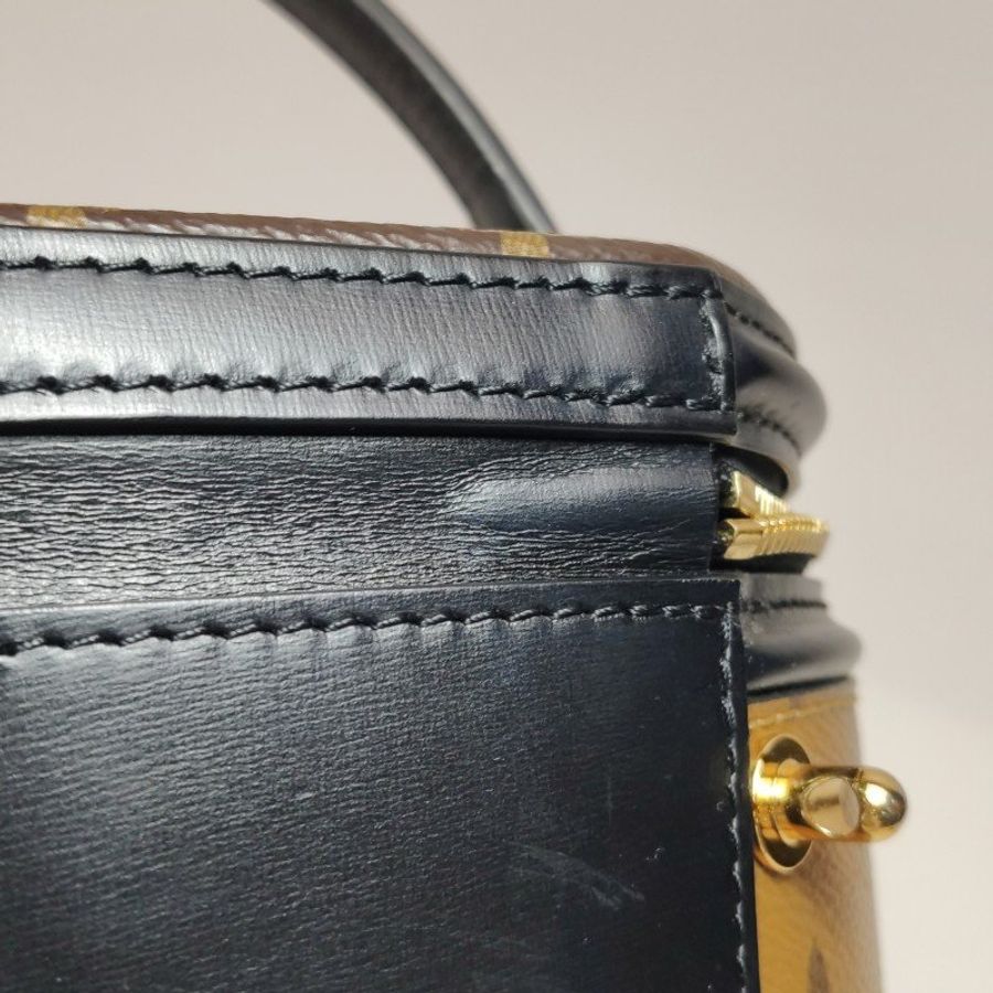 Louis Vuitton (LV) Cannes發財桶小號牛皮Reverse老花單肩包晶片款-24