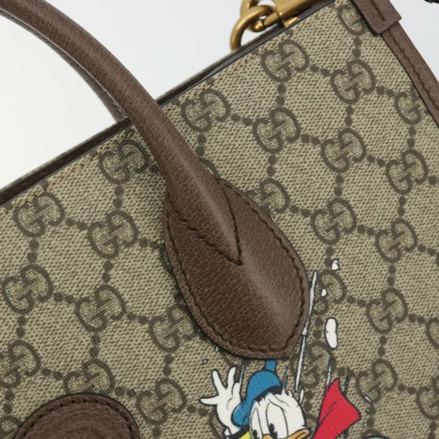 【日本直送】GUCCI GG Supreme 唐老鴨手提包 PVC 兩用 米色/金色 648134 正品 190456M-18