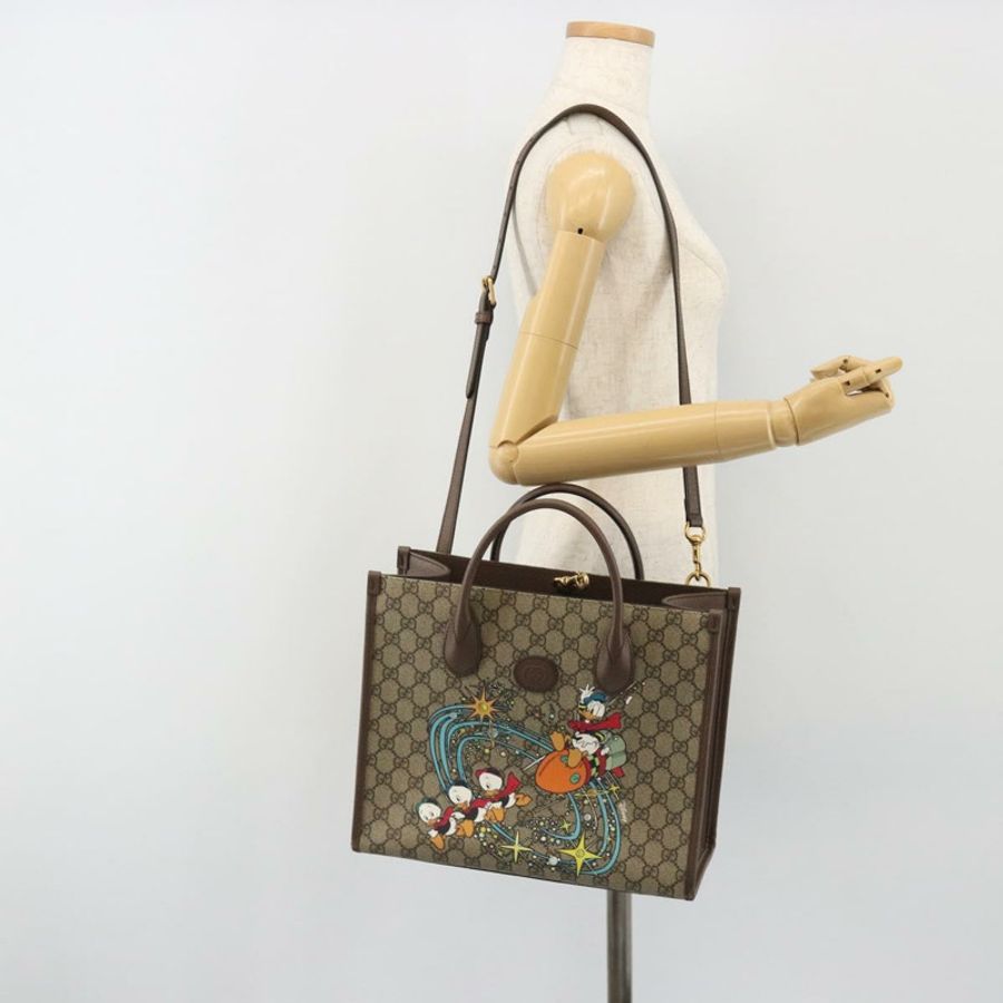 【日本直送】GUCCI GG Supreme 唐老鴨手提包 PVC 兩用 米色/金色 648134 正品 190456M-26