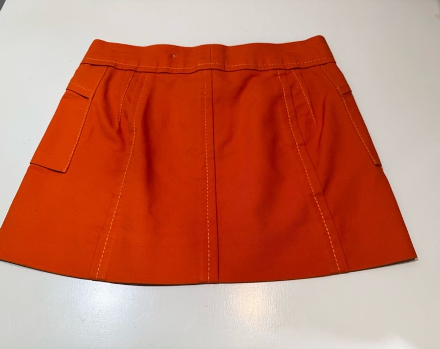 《新歡舊愛》正品LV路易威登橘紅色版挺短裙36/S-5