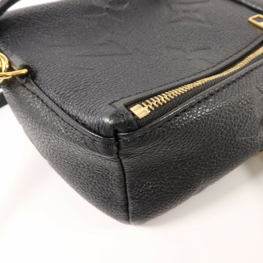LOUIS VUITTON Monogram Empreinte Tiny Backpack金扣背包-11