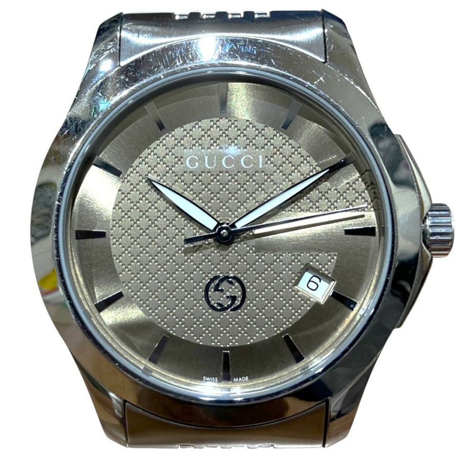Gucci G-Timeless腕錶，總重96.4克，不鏽鋼材質，石英機芯，淺棕色錶盤。 126.4-0