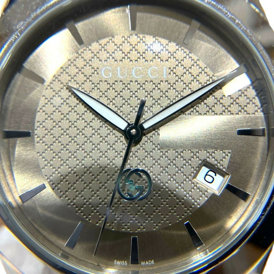 Gucci G-Timeless腕錶，總重96.4克，不鏽鋼材質，石英機芯，淺棕色錶盤。 126.4-3