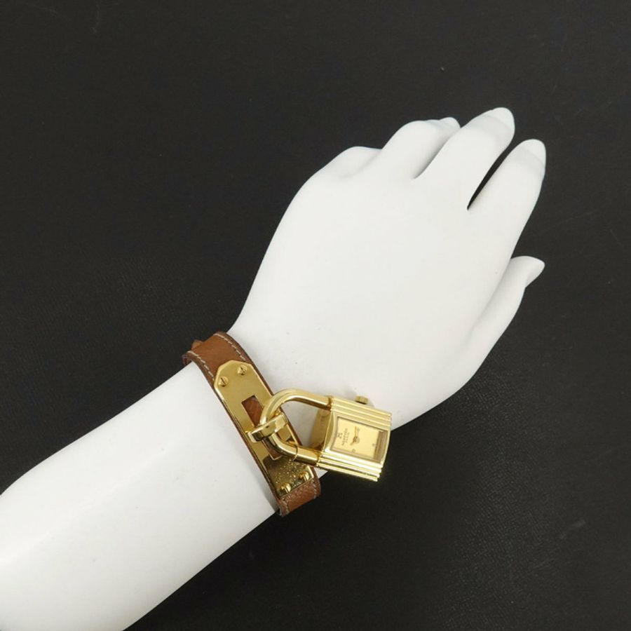 愛馬仕凱莉女士腕錶,金色和棕色石英錶,帶掛鎖-2