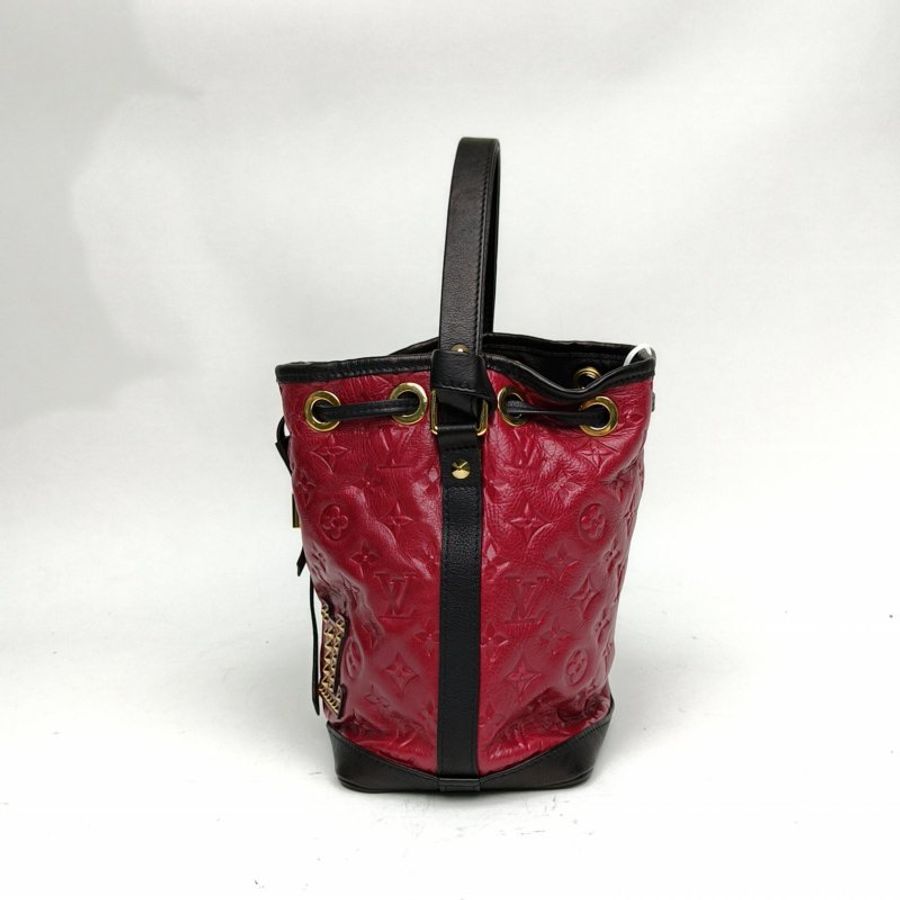 LOUIS VUITTON 紫色牛皮金扣秀款Noe二合一水桶包肩背包-1