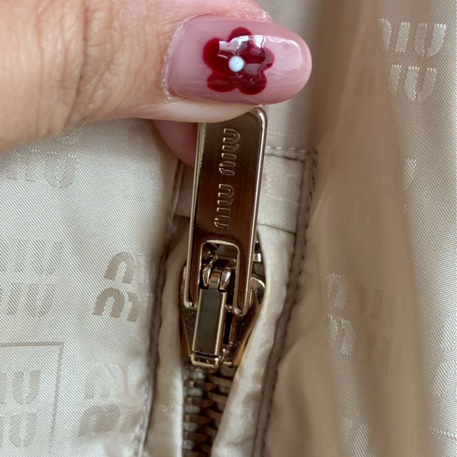 miumiu 沙宗色滿版logo外套🧥38-24