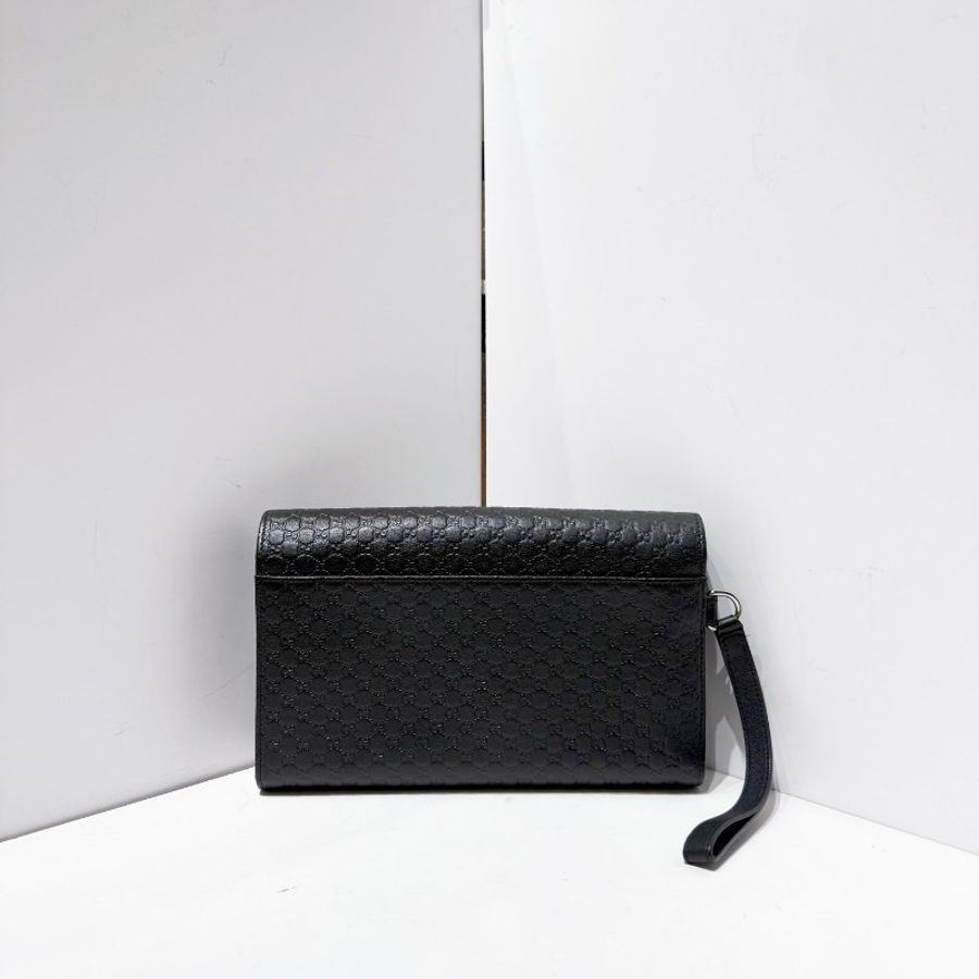 Gucci 壓紋logo老花黑銀配色手拿包-2