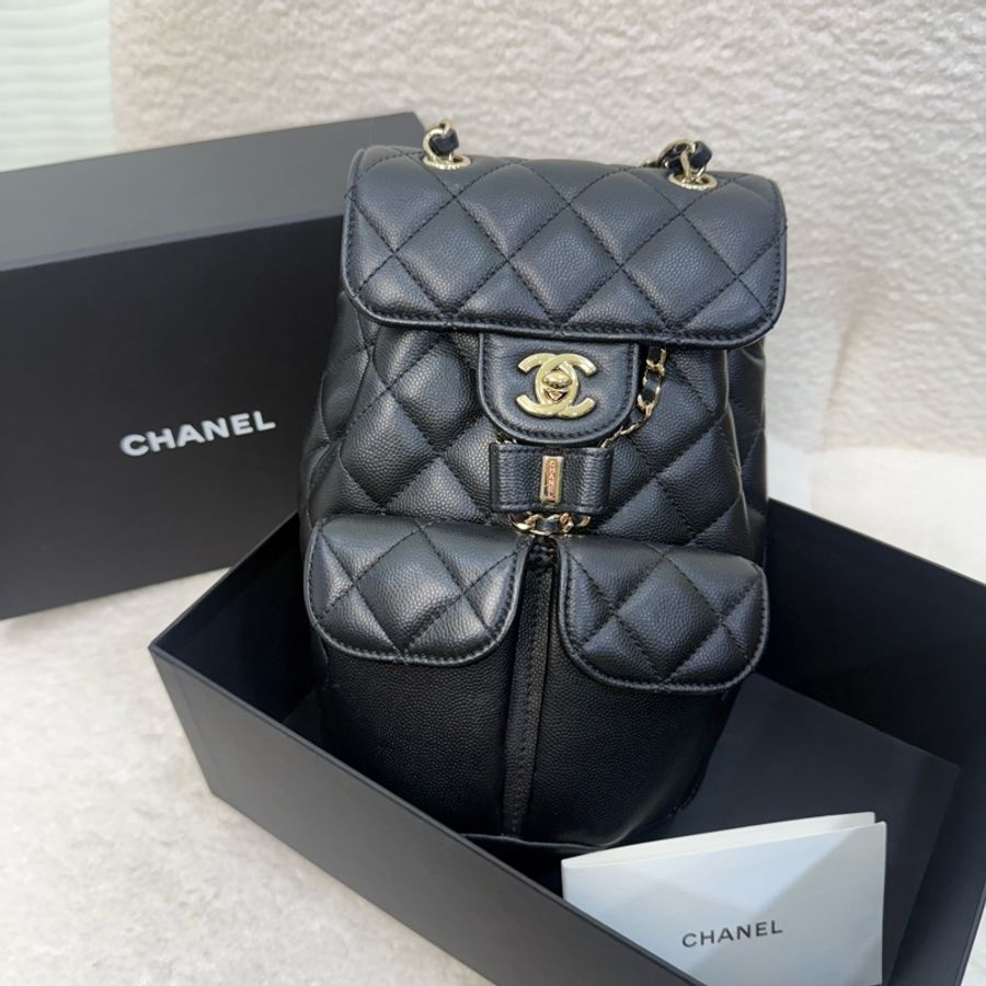 Chanel黑淡金釦粒紋牛皮雙肩束口後背包-1