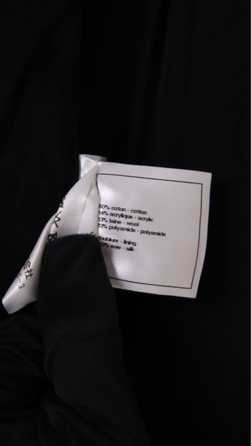 Chanel 18年森林系列秀款jennie同款黑色不规则下摆细闪两口袋外套-34