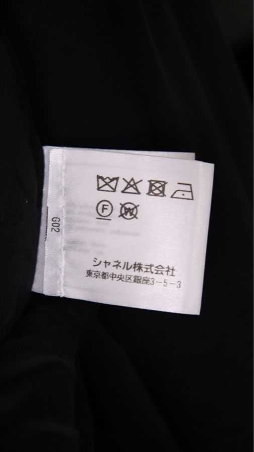 Chanel 18年森林系列秀款jennie同款黑色不规则下摆细闪两口袋外套-37