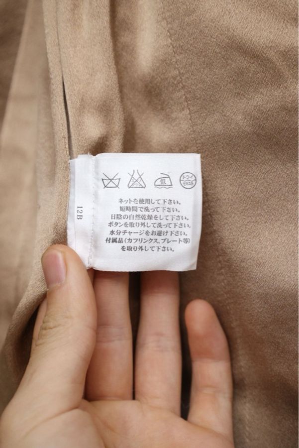 Chanel 05年秀款银镂空木扣波浪纹粗花呢外套半裙套装-17