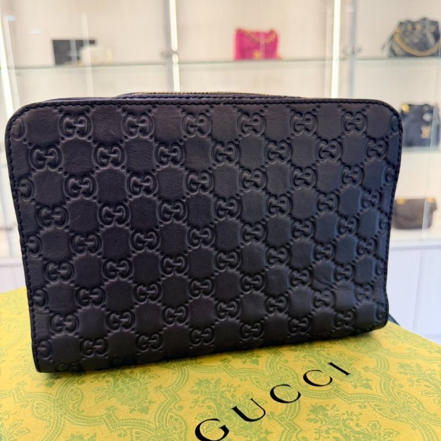 Gucci Signature 壓紋手拿包-1