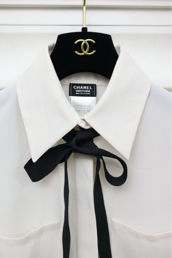 Chanel白色两口袋黑色蝴蝶结马甲背心上衣-4