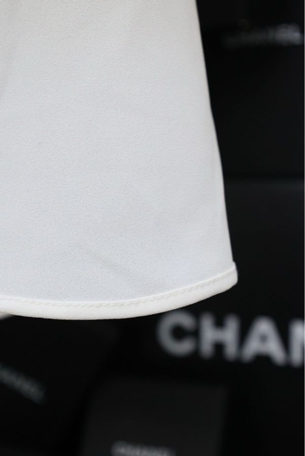 Chanel白色两口袋黑色蝴蝶结马甲背心上衣-13