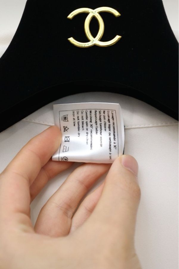 Chanel白色两口袋黑色蝴蝶结马甲背心上衣-14